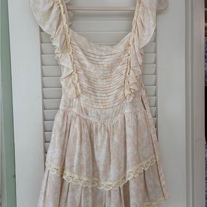 Elegant Cream Ruffled Mini Dress